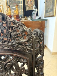 A pair of Chinese finely carved hongmu armchairs, Canton, 19th C.