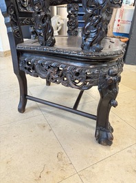A pair of Chinese finely carved hongmu armchairs, Canton, 19th C.