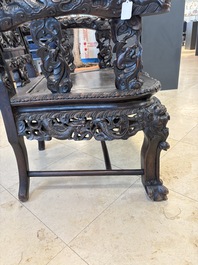 A pair of Chinese finely carved hongmu armchairs, Canton, 19th C.