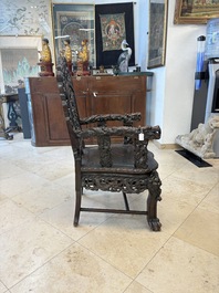 A pair of Chinese finely carved hongmu armchairs, Canton, 19th C.