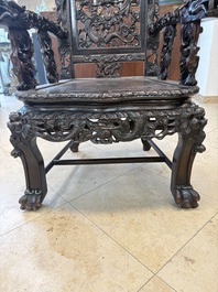 A pair of Chinese finely carved hongmu armchairs, Canton, 19th C.