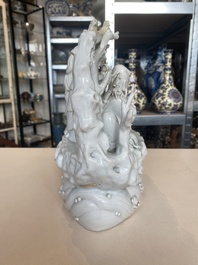 A Chinese Dehua blanc de Chine group of four deities on a boat, Republic