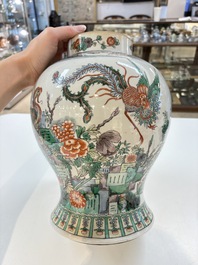 A Chinese famille verte 'phoenixes' vase and cover, 19th C.