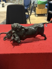 A Japanese bronze okimono of a tiger and a bull, signed Sano Takachika 佐野隆親, Meiji, 19th C.