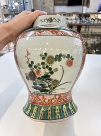Two Chinese famille verte 'flowers and mythical animals' vases, 19th C.