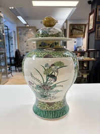 A pair of Chinese verte-biscuit 'cranes and flowers' vases and covers, 19th C.