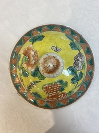 A pair of Chinese famille verte yellow-ground 'pheasants and peonies' vases and covers, 19th C.