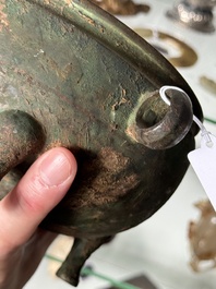 A Chinese archaic bronze tripod food vessel, 'dun 敦', Eastern Zhou