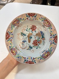 A set of 12 Chinese famille rose plates with squirrels among grapes and peonies, Qianlong