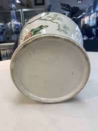 Two Chinese famille verte 'birds and flowers' vases and covers, 19th C.