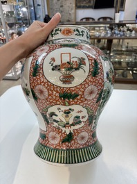 Two Chinese famille verte 'flowers and mythical animals' vases, 19th C.