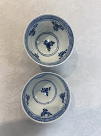 A set of 11 Chinese blue and white 'rabbit hunt' cups and saucers, Qianlong mark, 19th C.
