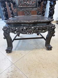 A pair of Chinese finely carved hongmu armchairs, Canton, 19th C.