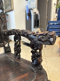 A pair of Chinese finely carved hongmu armchairs, Canton, 19th C.