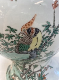 Two Chinese famille verte 'birds and flowers' vases and covers, 19th C.