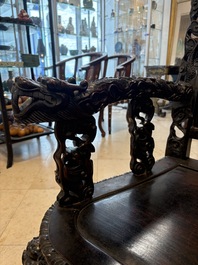 A pair of Chinese finely carved hongmu armchairs, Canton, 19th C.