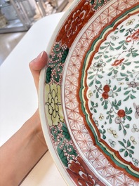 A Chinese wucai dish with floral design, Kangxi mark and of the period