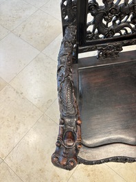 A pair of Chinese finely carved hongmu armchairs, Canton, 19th C.