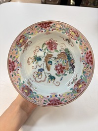 A set of 12 Chinese famille rose plates with squirrels among grapes and peonies, Qianlong