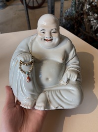 A Chinese gilt- and iron-red-decorated white-glazed Milefo Buddha, a famille rose vase and a brush pot, Qianlong and Xue Changseng 薛長森 mark, 20th C.