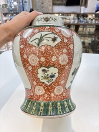 Two Chinese famille verte 'flowers and mythical animals' vases, 19th C.