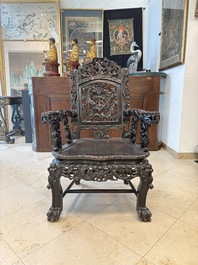 A pair of Chinese finely carved hongmu armchairs, Canton, 19th C.