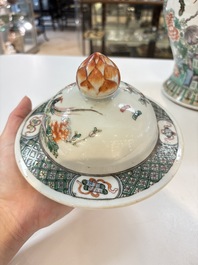 A Chinese famille verte 'phoenixes' vase and cover, 19th C.