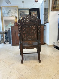 A pair of Chinese finely carved hongmu armchairs, Canton, 19th C.