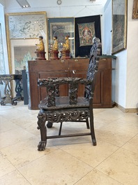 A pair of Chinese finely carved hongmu armchairs, Canton, 19th C.