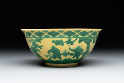 An imperial Chinese green-enamelled yellow-ground 'playing boys' bowl, Yongzheng mark and of the period