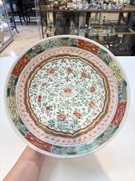 A Chinese wucai dish with floral design, Kangxi mark and of the period