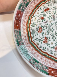 A Chinese wucai dish with floral design, Kangxi mark and of the period