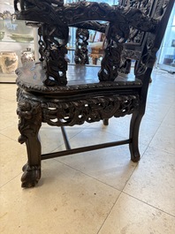 A pair of Chinese finely carved hongmu armchairs, Canton, 19th C.
