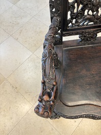 A pair of Chinese finely carved hongmu armchairs, Canton, 19th C.