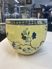 A Chinese famille rose yellow-ground 'pheasant and peony' scroll pot, 19th C.