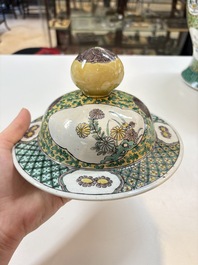 A pair of Chinese verte-biscuit 'cranes and flowers' vases and covers, 19th C.