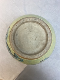 A Chinese famille rose yellow-ground 'pheasant and peony' scroll pot, 19th C.