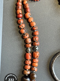 A varied group of five Tibetan necklaces, three rings and four earbobs with red coral, 19/20th C.