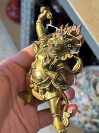 A Sino-Tibetan gilt-bronze Mahakala on stand, a Tibetan Vajradhaka and a Hayagriva, 19/20th C.