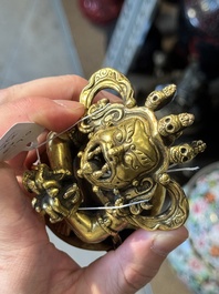 A Sino-Tibetan gilt-bronze Mahakala on stand, a Tibetan Vajradhaka and a Hayagriva, 19/20th C.