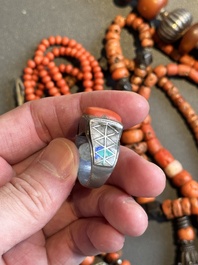 A varied group of five Tibetan necklaces, three rings and four earbobs with red coral, 19/20th C.