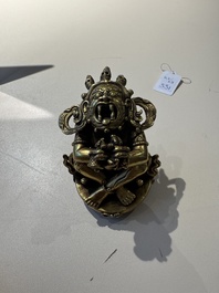 A Sino-Tibetan gilt-bronze Mahakala on stand, a Tibetan Vajradhaka and a Hayagriva, 19/20th C.