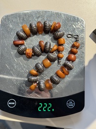 A varied group of five Tibetan necklaces, three rings and four earbobs with red coral, 19/20th C.