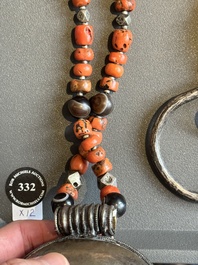 A varied group of five Tibetan necklaces, three rings and four earbobs with red coral, 19/20th C.