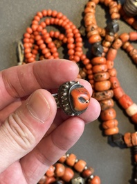 A varied group of five Tibetan necklaces, three rings and four earbobs with red coral, 19/20th C.