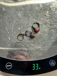 A varied group of five Tibetan necklaces, three rings and four earbobs with red coral, 19/20th C.