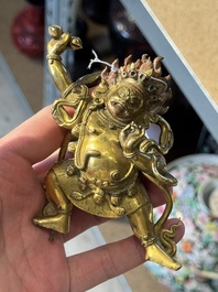 A Sino-Tibetan gilt-bronze Mahakala on stand, a Tibetan Vajradhaka and a Hayagriva, 19/20th C.