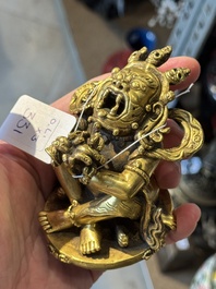 A Sino-Tibetan gilt-bronze Mahakala on stand, a Tibetan Vajradhaka and a Hayagriva, 19/20th C.