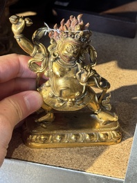 A Sino-Tibetan gilt-bronze Mahakala on stand, a Tibetan Vajradhaka and a Hayagriva, 19/20th C.