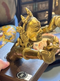 A Sino-Tibetan gilt-bronze Mahakala on stand, a Tibetan Vajradhaka and a Hayagriva, 19/20th C.